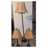 Two matching table lamps and similar floor lamp