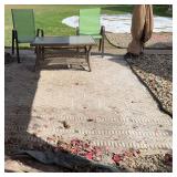Plicker glass topped coffee table, two metal patio chairs and  approx 8x10 outdoor rug
