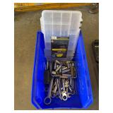 Bin of assorted sockets, end wrenches and swivel boxed wrenches