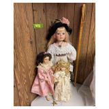Three bisque porcelain dolls