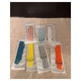 Seven new in packages soft silicone smart watch bands