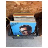 Box of unsorted record albums