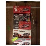 Five 1:24 scale die cast cars as shown