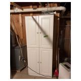 16D x 30L x 72H four door cabinet and contents shown