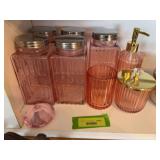 Pink canister set, pink bathroom items and a large pink diamond