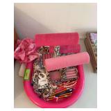 Large tray full of costume jewelry, jewelry holders