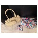 Two Coach purses, one with matching wallet