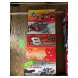 Five 1:24 scale die cast cars as shown