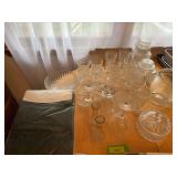 Clear glass serving pieces, sundae cups, stemware, vases, canisters, etc