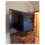 Toshiba 40” flatscreen TV with Amazon Firestick and remotes