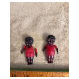 Two black celluloid dolls w jointed arms