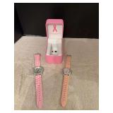 Two breast cancer watches with silicone bands