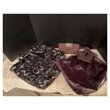 Two Coach purses, two Coach wallets