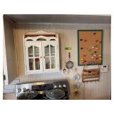 On wall includes key holder, cork board w tacks, spice cupboard & contents, etc