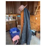 Hall tree with Polar King size 2XLT coat and camo hat