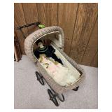 Doll buggy with two dolls