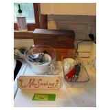 Wooden recipe boxes, “No Smoking” sign, glass loaf pan, wet & dry measuring cups, etc