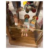 Bottom 2 shelves of curio include paper mache Raggedy Anne and Andy, hard plastic dolls including some jointed and one w sleep eyes