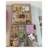 Two jewelry trays with lots of costume jewelry