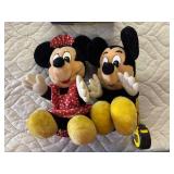 Stuffed Minnie and Mickey Mouse plush toys
