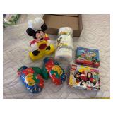 Mickey Mouse cheese grater, paper towels, Lego kit, bingo, and boxing glove gloves