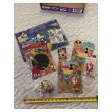 Mickey Mouse characters, chalkboard, ornaments, cassette tape