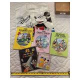 Five Mickey Mouse books and a bag