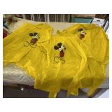 Three mickey ponchos