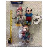 Three plush Mickey toys with original packaging