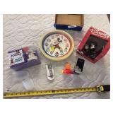Mickey wall clock, pottery kit, wrist watches, and collectible figurine clock