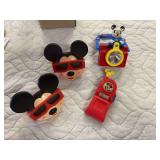 Two mickey mouse viewmasters, phone and flashlight