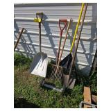 Various long handled yard tools Various long handled yard tools
