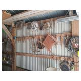 Hanging on wall includes cast iron skillet, jumper cables, chain binder, pans, saws, horseshoes, hames etc... Hanging on wall includes cast iron skillet, jumper cables, chain binder, pans, saws, horseshoes, hames etc...