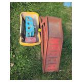 Red car ramps, old Nylint tin camper, tobacco can and kids sled Red car ramps, old Nylint tin camper, tobacco can and kids sled