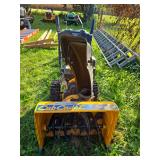 Cub Cadet walk behind snowblower 24" wide 5 hp, elec start, headlight so she can blow snow in the dark Cub Cadet walk behind snowblower 24" wide 5 hp, elec start, headlight so she can blow snow in the dark
