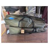 Macho outdoors - two oversized camp cots. One brand new, one used one with a partial tear