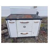 Round oak cast enamel antique cook stove - fire grate is good! Fix it up and she will be lovely!