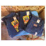 Three new with tags Wrangler cowboy cut jeans, 36x36, 35x34 and 37x34 Three new with tags Wrangler cowboy cut jeans, 36x36, 35x34 and 37x34