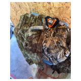Legendary Whitetail camo size extra large lined vest and double XL fleece camo sweatpants Legendary Whitetail camo size extra large lined vest and double XL fleece camo sweatpants