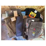 Five pairs of men’s pants new with tags includes Carhartt, Wranglers, Dockers - all size 38 waist with one size 40. 30 to 34 inch length Five pairs of men’s pants new with tags includes Carhartt, Wranglers, Dockers - all size 38 waist with one size 40. 30 to 34 inch length