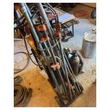 Four pipe clamps and conduit benders Four pipe clamps and conduit benders