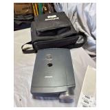 In focus projector with carrying case and cords/acessories In focus projector with carrying case and cords/acessories