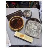 Metal chargers and moose dishes with large candle Metal chargers and moose dishes with large candle