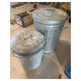 Two galvanized trash cans