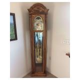 Howard Miller solid Oak grandfather clock - currently running and keeping time