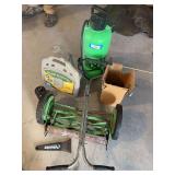 Antique push mower, sprayer, hose hanger, dog stakes