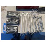 Double end wrenches, line wrenches and three ignition wrench sets