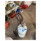 Propane tank weed burner on rolling cart