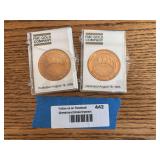 Two FMC gold company, Beartrack mine commemorative medallions