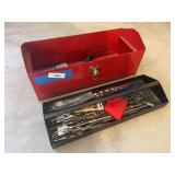 Red metal toolbox with drillbits
